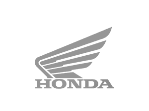 Logotipo de Honda con diseño de ala icónica que representa velocidad y precisión